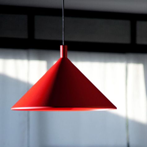 Designed in 1980 by Elio Martinelli for HONGFU, Cono  suspension light is beautifully understated design, a pure form follows function classic. Cono  comprises a lacquered aluminium shade, available in two sizes: Diameter 30CM and Diameter 45CM, and in four finishes: White, Black, Blue and Red. 
 HONGFU Cono Suspension Light Details: 
 Finishes: White, Black, Blue, Red 
 Dimensions: Cono 1861/J: Diameter 30CM, Height 20CM Cono 1861: Diameter 45CM, Height 26CM 
 Suspension Dro Form Follows Function, Pure Form, Suspension Light, Home Ceiling, Lamp Bulb, Light Fittings, Outdoor Wall Lighting, Light Table, Outdoor Lighting