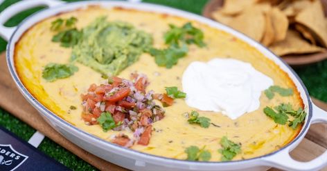 Make game day-worthy dip with layers of taco meat, queso, guacamole, sour cream and pico de gallo. Frito Pie, Queso Recipe, American Dishes, Tailgating Recipes, Signature Dishes, Football Food, Tex Mex, Game Day Food, Appetizer Dips