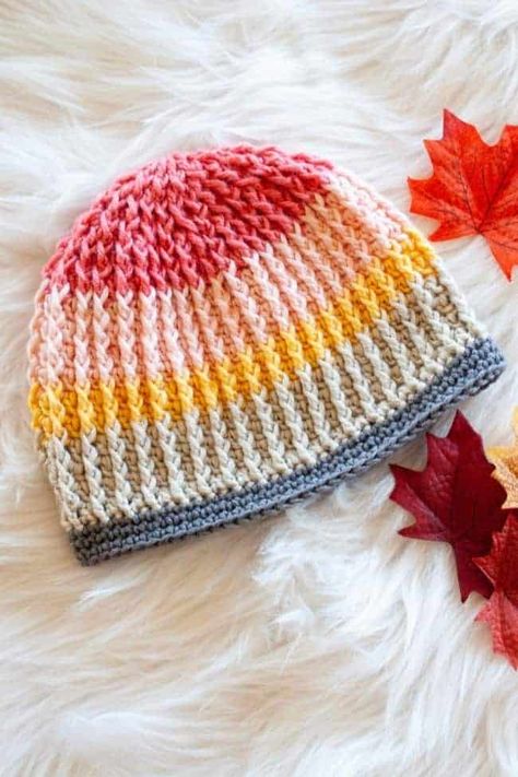 Make a warm and snuggly beanie sytle hat using this free crochet pattern. Use rich reds and greens for a quick to crochet Christmas gift. #crochet #freecrochetpattern #christmascrochet Crochet Adult Hat, Crochet Wrap Pattern, Crochet Unique, Crochet Baby Hat Patterns, Crochet Christmas Gifts, Front Post Double Crochet, Baby Hat Patterns, Crochet Hat Free, Bonnet Crochet