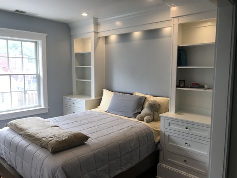 Bed With Overhead Storage, Built In Master Bed Headboard, Bedroom Storage Over Bed, Master Bed Built In, Surround Bed Storage, Bed Between Closets, Bed Surround Storage Built Ins, Built In King Bed, Bed Coming Out Of Closet