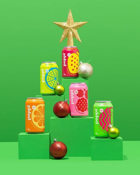 Photo by Poppi on December 24, 2022. May be an image of drink. Gift Drink Ideas, Christmas Product Campaign, Christmas Drinks Photography, Christmas Ad Campaign, Holiday Product Photoshoot, Christmas Product Shoot, Christmas Content Ideas, New Year Photo Ideas, Holiday Product Photography