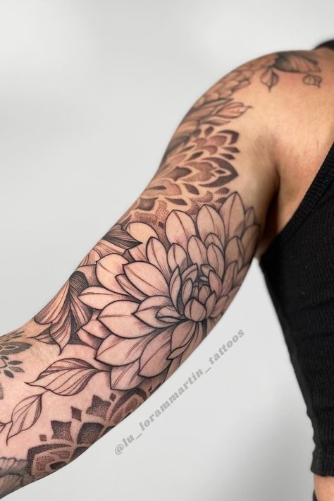 Shows an arm with fresh black linework tattoo of dahlias and dotwork mandalas. With black line details and shading. Mandala Inner Bicep Tattoo, Dainty Filler Tattoo, Floral And Geometric Tattoo Sleeve, Mandala Tattoo Back Women, Botanical Tattoo Sleeve Delicate, Mandala Tattoo With Flowers, Mandala Flower Tattoos Forearm, Line Work Sleeve Tattoo, Mandala Background Tattoo