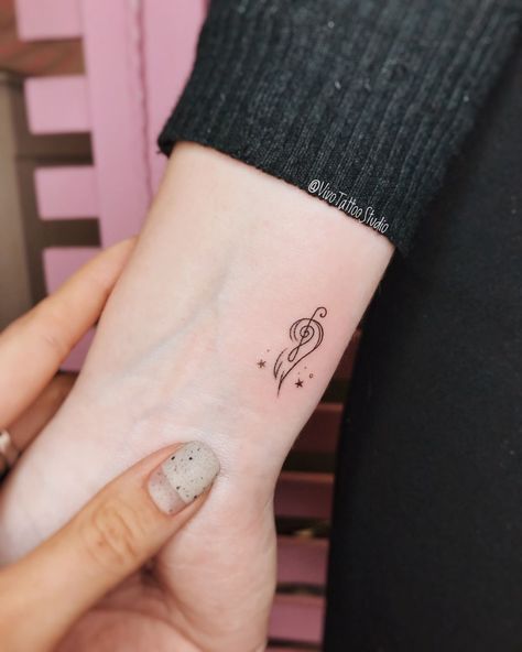 Tiny Music Tattoo, Tattoos About Music, Small Music Tattoos, Word Tattoo Ideas, Hand Tattoo Designs, Tattoo Music, Tiny Wrist Tattoos, Word Tattoo, Planet Tattoos