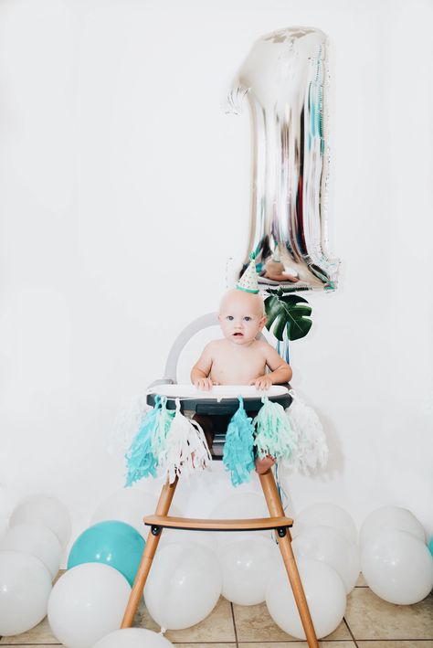 Tropical theme baby is one first celebration boy palm tree ballon big idea skip hop high chair white backdrop 1st Birthday High Chair Backdrop, Baby Birthday Photoshoot, 1st Birthday Party For Girls, Boys First Birthday Party Ideas, Boy Birthday Party Themes, Twin First Birthday, Girl Birthday Themes, Smash Cake Photoshoot, Baby Boy 1st Birthday