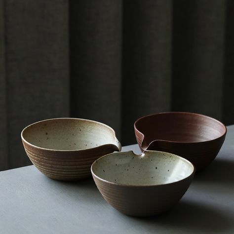 Discover the authentic essence of the Japanese tea ceremony with our handcrafted coarse pottery Matcha Bowl. Each piece, unique in its rustic elegance, is designed to elevate your matcha experience. The textured, earthy brown glaze and the distinctive spout for easy pouring capture the wabi-sabi philosophy, celebrating beauty in imperfection. Ideal for dry scooping or sharing tea, this chawan is not just a bowl, but a piece of art that connects you to the centuries-old tradition of matcha. #... Matcha Set, Bamboo Tea, Traditional Pottery, Rustic Ceramics, Japanese Tea Ceremony, Matcha Bowl, Tea Bowl, Matcha Tea, Tea Tray