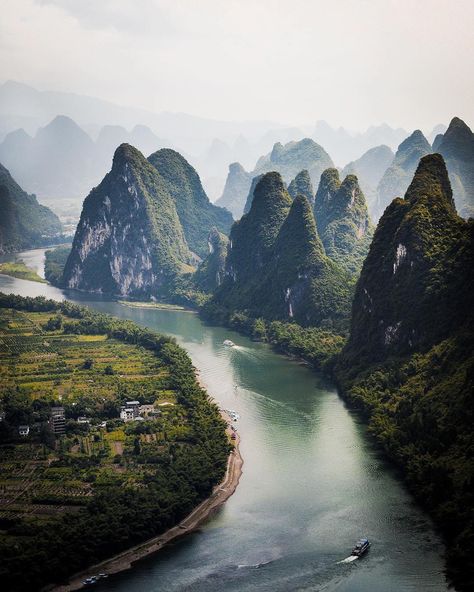 One of my all time favorite places I’ve been to is Yangshuo in China!🇨🇳 The endless layers of karst mountains rising up near the Li River… Yangshuo China, Explore China, Lijiang, Kunming, Guilin, Halong Bay, Destination Voyage, China Travel, Beautiful Places To Visit