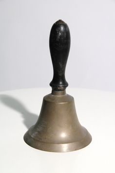 Hand bell used to signal start of school, change of classes, end of recess. Primary School Nostalgia, Desk Bell, Teacher's Desk, School Hallway, Vintage Childhood, Ring Bell, Old School House, Childhood Memories 70s, Teacher Desk