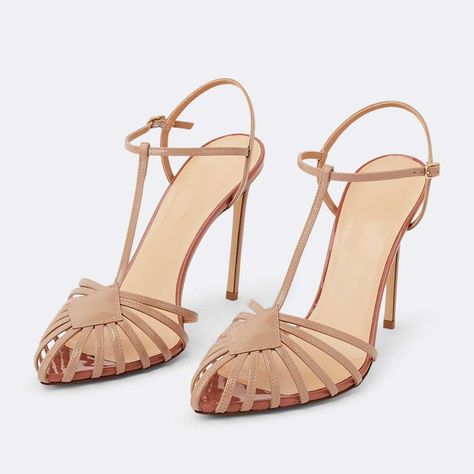 Elevate your style with these apricot t-strap slingback stiletto heeled sandals. Featuring a sleek cage strappy design, these sandals add flair to any outfit, blending sophistication and trendiness effortlessly. Color: Nude Material: Patent leather Heel Type: Stiletto heel Heel height: 4.72" / 120 mm approx Product measurements were taken using size 8. Please note that measurements may vary by size. Toe: Pointed toe Adjustable buckle strap design Handcrafted US sizing. Fits true to size. Shoes For Wedding Guest Heels, Shoes For Wedding Guest, Wedding Guest Heels, Nude Strappy Heels, Nude Sandals, Walk In My Shoes, Patent Leather Heels, Strap Design, Shoe Obsession