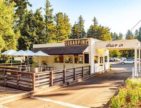 Cars still line up here, but nowadays their drivers are here for tasty food - not oil changes. This adorable little drive-in is located in Troutdale, surrounded by huge Douglas firs at the mouth of the Columbia River Gorge. Troutdale Oregon, Portland City, Factory Lighting, Community Park, Columbia River Gorge, Farm Stand, Drive Thru, Outdoor Sconces, The Grove