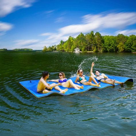 This Floating Water Pad Will Take Lake Day To The Next Level Fish Pool, Floating Mat, Water Pad, Sport Pool, Pool Rafts, Water Mat, Floating Water, Swimming Tips, Lake Beach