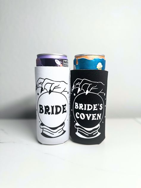 For my witchy brides! - These tall coozies are great for your spooky wedding or bachelorette party!  - Perfect for taller SLIM can beverages  - The coozies are 3.5" W x 5" H made with white & black heat transfer vinyl - Bride will be made on a white can cooler / Bride's coven will be made on a black can cooler - I can customize them if you have any changes! :)  - Price is per coozie - Open to custom personalization, just send me a message! :) Coven Themed Bachelorette Party, Witchy Bachelorette Party Ideas, Witchy Bachelorette, Witch Bachelorette Party, Salem Bachelorette Party, Witchy Bachelorette Party, Spooky Bachelorette Party, Spooky Wedding, Halloween Bachelorette Party