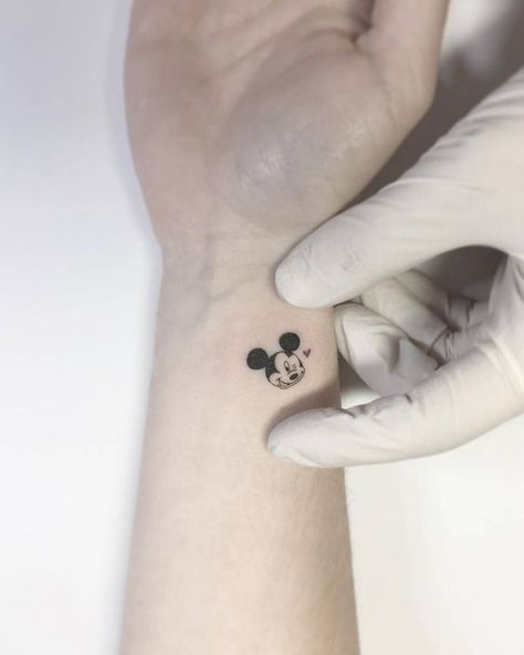 Mickey Mouse tattoo on the wrist. Mickey And Minnie Tattoos, Minnie Tattoo, Mickey Tattoo, Mouse Tattoo, Mickey Mouse Tattoo, Tattoo On Wrist, Tiny Wrist Tattoos, Mouse Tattoos, Disney Tattoo