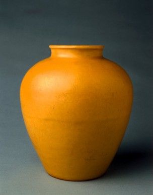 Porcelain ovoid jar with short neck and rolled rim. The jar has yellow enamel over a plain felspathic glaze. There are incised phoenixes among clouds with flower spray above and petal decoration below. There is an incised mark on the base. Table Wear, Coil Pots, Short Neck, Chinese Pottery, Flower Spray, The Jar, Art Painting Acrylic, Woodturning, Museum Collection