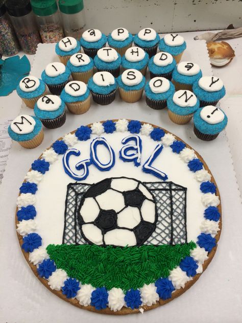 Soccer cookie cake with cupcakes Soccer Cookie Cake, Soccer Birthday Cookies Decorated, Cookie Cake Football Designs, Soccer Cookie Cake Ideas, Soccer Ice Cream Cake, Cupcake Soccer Ball, Soccer Cookies, Cake With Cupcakes, Birthday Ice Cream