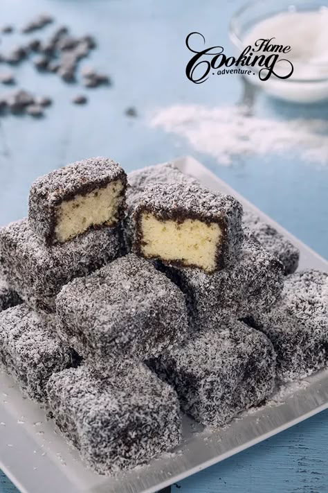 Australian Lamingtons, Lamington Cake Recipe, Lamingtons Recipe, Adventure Videos, Cake Squares, Cake Dip, Around The World Recipes, Desiccated Coconut, Vanilla Sponge Cake