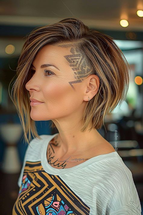 The Trendiest Layered Bob Haircuts of 2024 Sporty Haircuts For Women, Mid Length Undercut, Long Hair With Undercut For Women, Undercut Medium Hair, Asymetrical Haircut Edgy Bob, Undercut Ideas For Women, Under Layer Hair Dye, Short Angled Bob Hairstyles, Disconnected Layers