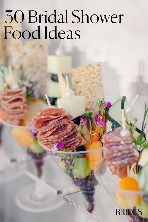 Are you hosting a bridal shower, but you’re unsure what dishes to serve? Here are 30 bridal shower food ideas that are perfect for every palate and every style celebration, plus expert tips to nail your menu selection. Bridal Shower Recipe Ideas, Food At Bridal Showers, Bridal Shower Fruit Kabobs, Bride Shower Food Ideas, Unique Bridal Shower Food Ideas, Finger Foods For Bridal Shower Brunch, Dinner Bridal Shower Food, Bridal Shower Catering Ideas, Winery Bridal Shower Food Ideas