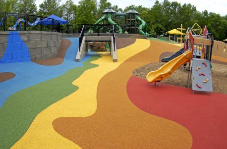 Elm Creek Park - Maple Grove, MN - Highlights of the new Elm Creek Park Reserve Creative Play Area include an 18-foot climbing net, a 30-foot dinosaur buried in the sand, a rock wall, seven slides and plenty of spots for parents to sit and watch their kids. Minnesota Travel, Maple Grove, River Park, Three Rivers, Play Equipment, Covered Bridges, Picnic Area, Still Water, Play Area