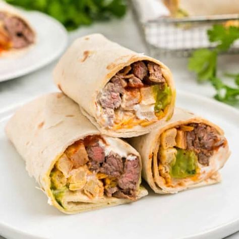 California Burrito Cali Burrito Recipe, Surf And Turf Burrito Recipe, Burrito Ingredients, California Burrito, Easy Marinades, Surf And Turf, Burritos Recipe, Homemade Guacamole, Juicy Steak