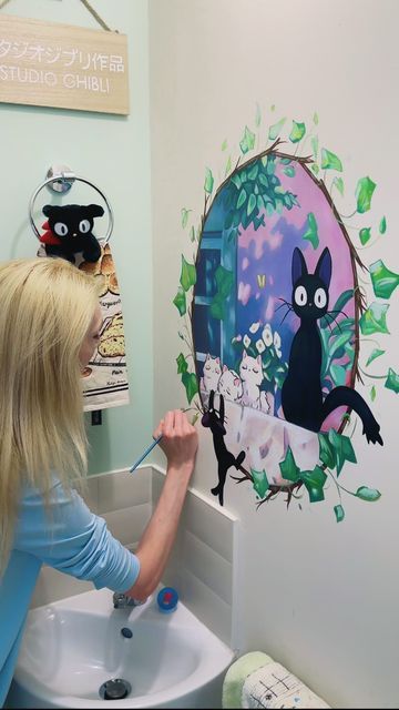 Jamie Jo Art on Instagram: "Kiki’s Delivery Service is my fav 😍 Thought this might be an interesting video to let you know that I do clean dust from my paintings 🎨🧼🫧 and do paint touch ups on the murals in more high traffic areas 😅 I like using lent rollers for the dust, and I don’t have clean too often, but it definitely makes them feel fresh and nice again!  #studioghibli #art #painting #wallmural #homeideas #homedesign #kiki #jiji #kikisdeliveryservice #anime #animemovie #paint #acrylic #animeart #wallart #bathroomdesign #interiordesign" Anime Mural, Places Reference, Ghibli Crafts, Studio Ghibli Crafts, Cartoon Friends, Kiki Delivery, Kiki's Delivery Service, Paint Acrylic, Studio Ghibli Art