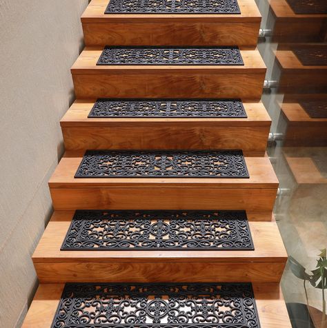 PRICES MAY VARY. STAIR TREAD SET CONTAINS: Six (6) IRONGATE Welcome Staircase Mats in Black, each measuring 10" x 30" to fit easily on any step. DECORATIVE, FUNCTIONAL, HIGH-QUALITY CONSTRUCTION: This durable stair mat is made from solid rubber to stand up to heavy use and create a safer, non-slip surface where you need one. The scrollwork design takes inspiration from iron grillwork to instantly add a classic aesthetic to any boring stair well. Heavy duty, pet friendly and sturdy construction w Inside Steps Ideas, Steps For Front Of House, Entryway Stairs Ideas, Nonslip Stair Ideas, Decorative Stairs, Pool Balcony, Scrollwork Design, Stair Well, Step Treads