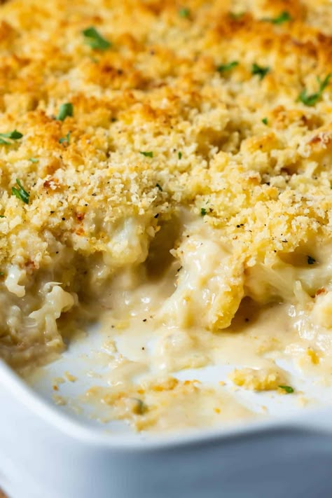 Vegan cauliflower cheese is the most delicious way to eat cauliflower! Roasted cauliflower smothered in vegan cheese sauce, topped with breadcrumbs and baked until golden. Cauliflower Cheese Bake, Cauliflower Roasted, Vegan Cauliflower Recipes, Vegan Cheese Sauce, Vegan Cauliflower, Cauliflower Cheese, Vegan Side Dishes, Baked Cauliflower, Vegan Thanksgiving