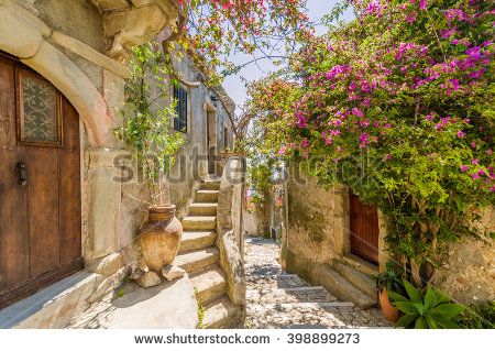 Fancy flower decorated narrow sunny street with stairs in old town in summer sunshine, Sicily, Italy Italian House Exterior, Old Italian House, White Exterior Houses, Best Places To Retire, Aeolian Islands, Street Stock, Italian Home, Black House Exterior, Sicily Italy