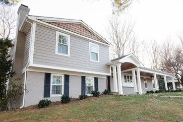 Split level exterior-painted brick-barrel vault ceiling entryway Split Level Home Designs, Split Level House Exterior, Tri Level House, Split Level Remodel Exterior, Split Level Exterior, Split Level Remodel, Raised Ranch, Exterior House Remodel, Gray House