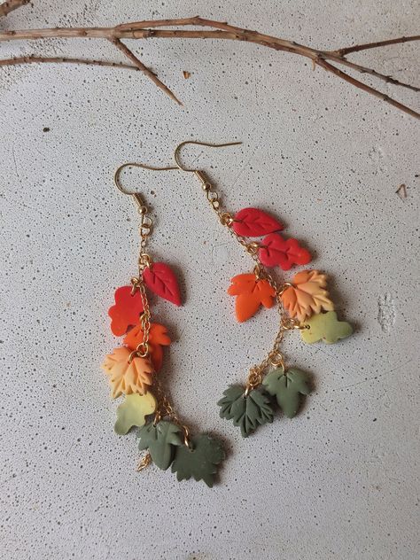 All the colors of fall in one place. Handmade Polymer Clay earrings for fall. Autumnal Polymer Clay Earrings, Fall Themed Jewelry, Autumn Earrings Diy, Fall Inspired Clay Earrings, Pumpkin Earrings Clay, Clay Crafts Gifts, Hocus Pocus Clay Earrings, Polymer Clay Thanksgiving Earrings, Polymer Clay Fall Ideas