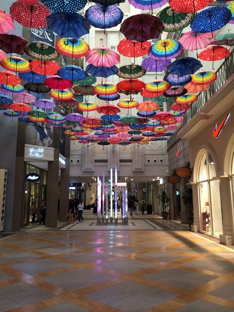 Umbrella ceiling Hanging Umbrellas From Ceiling, Nola Aesthetic, Umbrella Ceiling, Beetlejuice Room, Hanging Umbrellas, Show Window, City Ideas, High Spirits, Dubai Mall