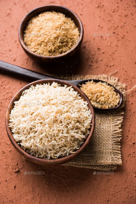 Brown Rice - Cooked and Raw by stockimagefactory. Indian brown wholegrain basmati Rice in cooked and raw form, served in a bowl. selective focus #Sponsored #Indian, #stockimagefactory, #wholegrain, #brown Brown Rice Aesthetic, Appy Fizz, Raw Rice, Rice Photography, Rice Packaging, Fairy Food, Cycle Syncing, Photos Background, Basmati Rice