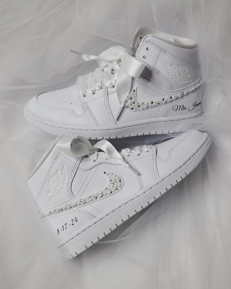 Wedding Sneakers for the Bride. 🕊️💍✨. . . . . . #customshoes #customsneakers #customjordans #rhinestones #artist #sneakerhead #sneakeraddict #sneakergallery #weddinginspiration #bridalshoes #bridetobe #instawedding #bridalsneakers #weddingsneakers #pearls #satin Sneakers For Bride, Wedding Sneakers For Bride, Dresses With Tennis Shoes, Aj1 Mid, Sneakers Wedding, Bride Sneakers, Wedding Shoes Sneakers, Quinceanera Shoes, High Top Jordans