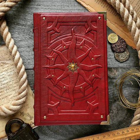 the Red Sun journal by MilleCuirs on DeviantArt Inverted Pentacle, Spooky Books, Handmade Sketchbook, Leather Working Patterns, Custom Journal, Grimoire Book, Leather Journal Notebook, Leather Bound Journal, Handmade Leather Journal