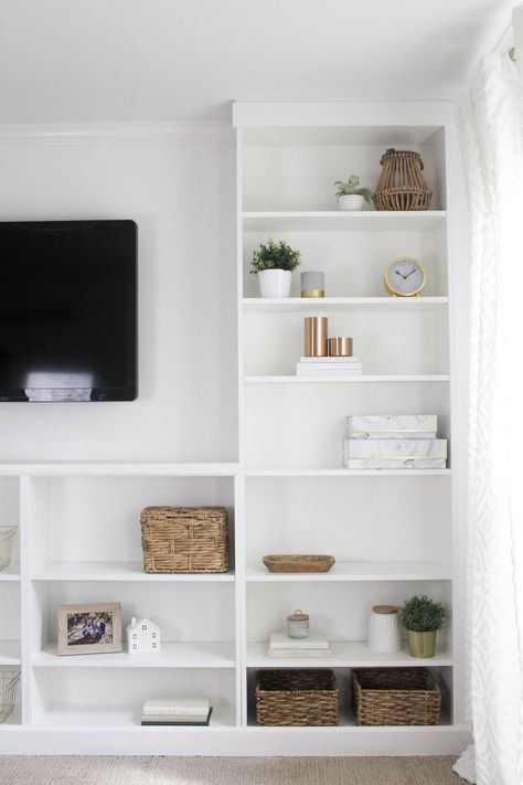 Complete a wall of built-ins on a budget by turning a set of IKEA Billy bookcases into a DIY set of built -ins. This is an IKEA hack you will want to see. https://arinsolangeathome.com #ikeahack #builtin Diy Built Ins, Billy Ikea, Bookcase Hack, Ikea Built In, Decor Stairs, Living Room And Family Room, Billy Bookcase Hack, Ikea Billy Bookcase Hack, Bookcase Diy