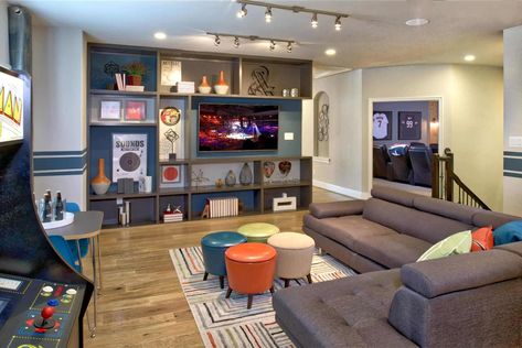 https://definebottle.com/wp-content/uploads/Versatile-Recreation-Room.webp Family Loft Ideas, Teen Loft Hangout, Hang Out Room Ideas, Kids Entertainment Room, Storing Games, Rec Room Ideas, Teen Hangout Room, Teen Game Rooms, Big Couch