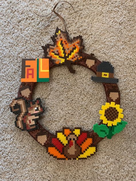 #perlerbead #wreath #holiday #falldecor Perler Bead Fall Leaves, Perler Beads Thanksgiving, Pearler Bead Patterns Thanksgiving, Halloween Perler Bead Wreath, Perler Bead Wreath, Autumn Hama Beads, Pumpkin Pearler Bead, Thanksgiving Crafts Diy, Fall Bead