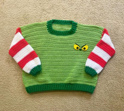 ✨Add To Cart✨ My Grinch Christmas sweater has been added back to the shop! 💚🎄 The perfect grab for when you can’t find something nice to wear to the Whoville Celebration 😏 •I N F O• Cropped Adult size XL Shoulder to waistband is 24” (all measurements are provided in the listing) •P A T T E R N• sweater base is Saved By The Sweater by @craftandacuppa •W H E R E• plantbasedhooker.etsy.com #grinch #christmassweater #sweaterweather #handmade #crochetsweater #crochetpullover #handmadesweater ... Crochet Ugly Christmas Sweater Pattern, Crochet Ugly Christmas Sweater, Grinch Christmas Sweater, Ugly Christmas Sweater Pattern, Christmas Sweater Pattern, Handmade Sweater, Something Nice, Something Interesting, Grinch Christmas