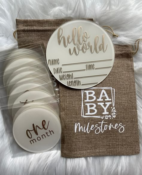 Our custom handmade IVORY + CHAMPAGNE GOLD Acrylic Baby Milestone Discs are perfect for any new addition to your family and make a wonderful baby gift for someone special.  Our months include: one month, two months, three months, four months, five months, six months, seven months, eight months, nine months, ten months, eleven months and one year. You also have the option to include: hello world and/or a name disc with your baby's first & last name/or middle name. The monthly discs have a 4" diameter with a thickness of 1/8"(3mm) and are hand painted for you .  A perfect way to create memorable pictures to capture every milestone to come.  Paint is sealed. The hello world / name disc have a 6" diameter with a thickness of 1/8"(3mm) and includes name, date, weight and height.  Information ca Birth Milestone Acrylic, Cricut Monthly Milestones, Acrylic Personalized Gifts, Acrylic Milestone Discs Diy, Diy Milestone Discs, Vinyl Project Ideas, Acrylic Projects Cricut, Things To Make With Cricut To Sell, Things To Make And Sell With Cricut