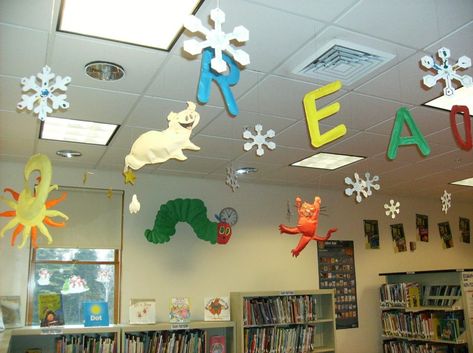 Decorations hanging from school library ceiling ... "Read", book ... School Decorations Ideas, Classroom Ceiling Decorations, Library Ceiling, Classroom Ceiling, School Library Decor, Classroom Decor Middle, School Library Displays, Classroom Decor High School, Library Book Displays