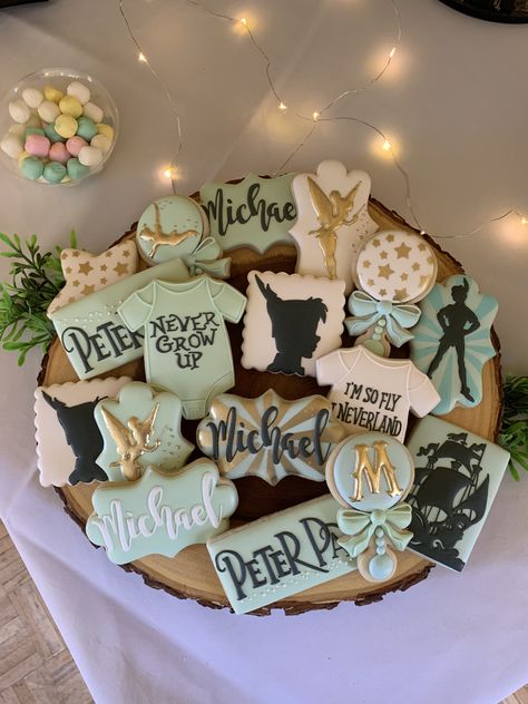 Neverland Cookies Peter Pan Party, Peter Pan Candy Bar, Peter Pan Themed Party Decorations, Peter Pan First Birthday Cake, Peter Pan 1st Birthday Cake, Peter Pan Themed Birthday Party, Tinker Bell And Peter Pan Birthday Theme, Tinkerbell Gender Reveal, Peter Pan Gender Reveal