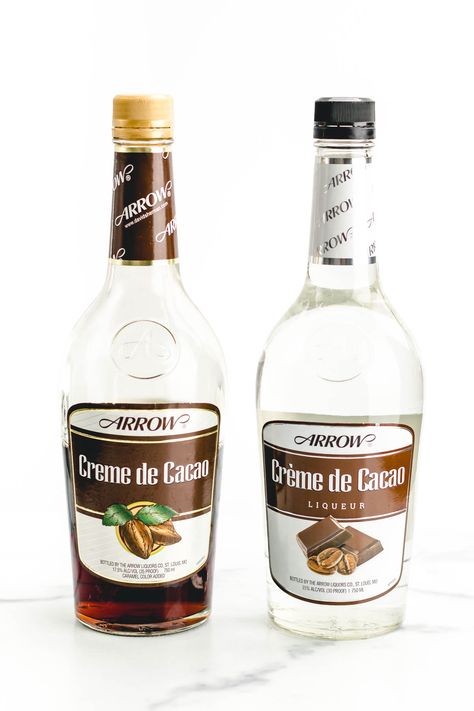 Not sure what to do with that bottle of Crème de Cacao? Learn what it is and what to make with this delicious chocolate-flavored liqueur. Creme De Cocoa Drink Recipes, Drinks With Chocolate Liquor, Crème De Cacao Drinks, Creme De Cacao Liqueur Recipes, Chocolate Alcohol, Peppermint Vodka, Pink Squirrel, White Chocolate Liqueur, Whipped Cream Vodka