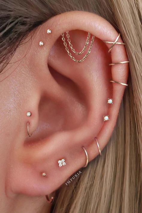 Aesthetic Ear Piercing Ideas for Females – Impuria Ear Piercing Jewelry Trendy Piercings Ear, Vertical Piercing Ears, Earrings Placement Ideas, Floating Ear Piercing, Ear Piercing Locations Chart, Ear Mapping Piercing Ideas, Multiple Helix Piercing, Unique Piercings Ears, Double Helix Piercings Aesthetic