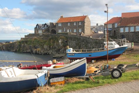 One of the more appealing fishing villages in the region, Craster draws walkers off the coastal path to its pub, art gallery and smokehouse set around an old harbour. Slow Northumberland; www.bradtguides.com Craster Northumberland, Unusual Landscapes, Dunstanburgh Castle, English Seaside, English Girl, Durham City, Northumberland Coast, Harbor Town, Scotland Castles