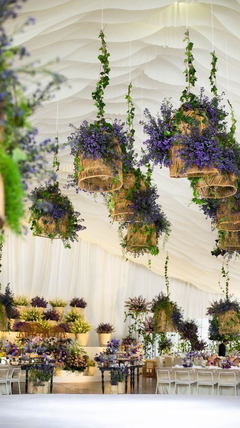 A general view of this amazing wedding with floral details in purple tones. How To Hang Flowers From Ceiling, Purple Floral Aesthetic, Peru Wedding, Hanging Centerpiece, Forest Theme Wedding, Wedding Entrance Decor, Flower Panels, Garden Decor Projects, Purple Tones