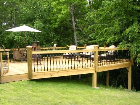 Decking in a sloping garden design? Terraced Landscaping, Sloped Yard, Cottage Plans, Backyard Garden Layout, Sloped Backyard, Wooden Deck, Backyard Garden Landscape, Hillside Landscaping, Sloped Garden