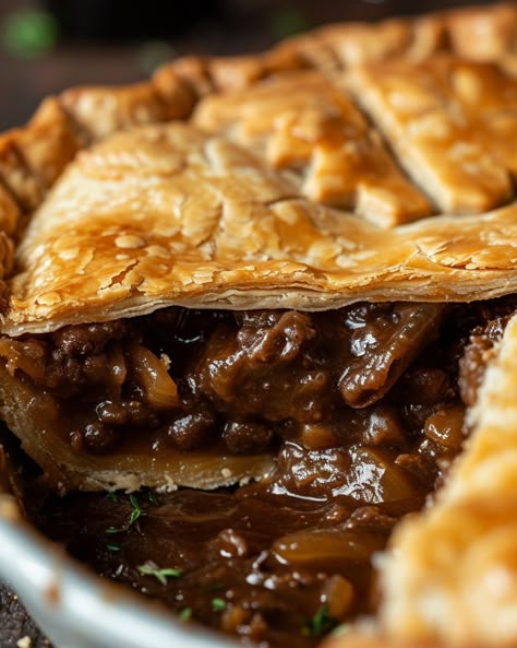 We learned about "Guinness Pie" 2 years ago and made it dozens of times! So good! Guinness Pie Recipe, Beef Stew Pie, Beef And Guinness Pie, Guinness Pie, Turkey Stew, Guinness Beef Stew, Veggie Fritters, Buttery Mashed Potatoes, Beef Pies