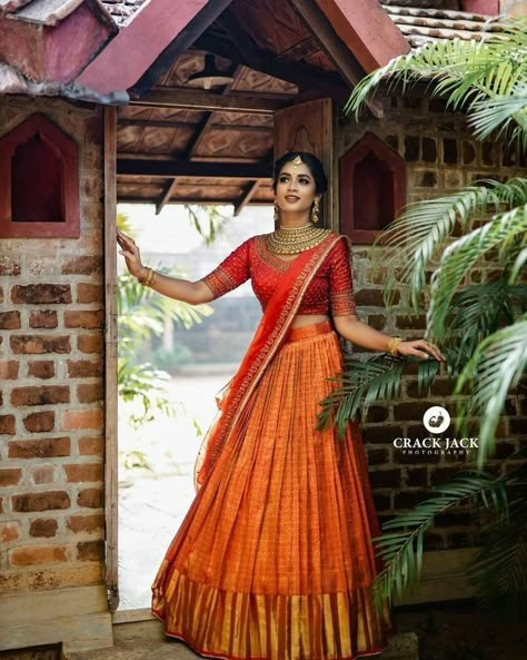 Kanjeevaram Half Saree Lehenga, New Trend Lehenga Designs, Kanjeevaram Lehenga, South Indian Lehenga, Kerala Engagement Dress, Onam Outfits, Orange Lehenga, Lehenga Saree Design, Half Saree Lehenga