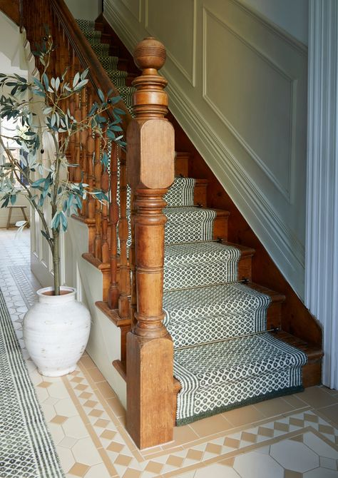 DIY stair runner Carpet Runner On Stairs Uk, Hallway Stairs Runner, Wood Stairs With Rug Runner, Wooden Stairs Carpet Runner, Wood Paneling Staircase Wall, Moroccan Stair Runner, Green Hall Stairs And Landing, Stair Runner With Brass Rods, Stair Carpet Runner With Rods