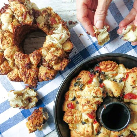 Savory Monkey Bread: 2-Ways are like its sweet namesake. It's a luscious treat that is so easy to prepare. A buttery pull-apart bread baked in a bundt pan with sauteed bacon and onion or black olive, mushroom, and pepper fillings tossed with chunks of flaky canned biscuits and cheese. Bundt Pan Stuffing, Biscuits And Cheese, French Donuts, Savory Monkey Bread, Chicken Party, Bundt Pan Recipes, Louisiana Woman, Party Sandwiches, Canned Biscuits