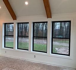 Fiberglass Windows Black, Black Window Interior Trim, Window Trim Ideas Interior Black Windows, Black Fiberglass Windows, Black Pella Windows, Pella Black Windows, Interior Black Windows With White Trim, Black Window With White Trim, Black Farmhouse Windows